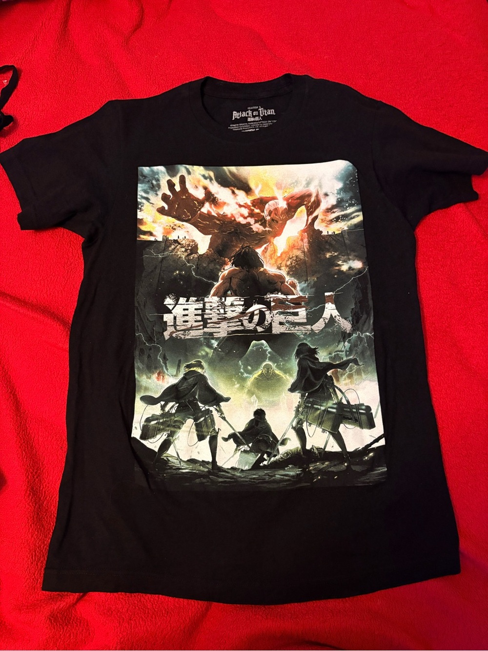 Ripple Junction Black Anime Graphic Tee with Multicolor Attack Design